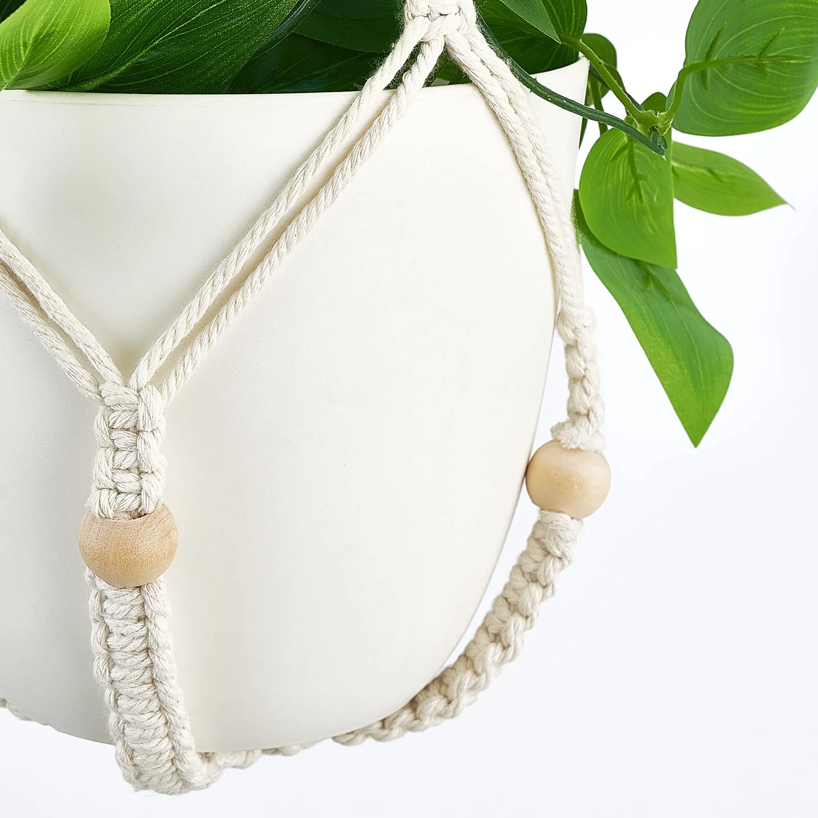 The square knot, repeated: the only structure a cotton hanger has.